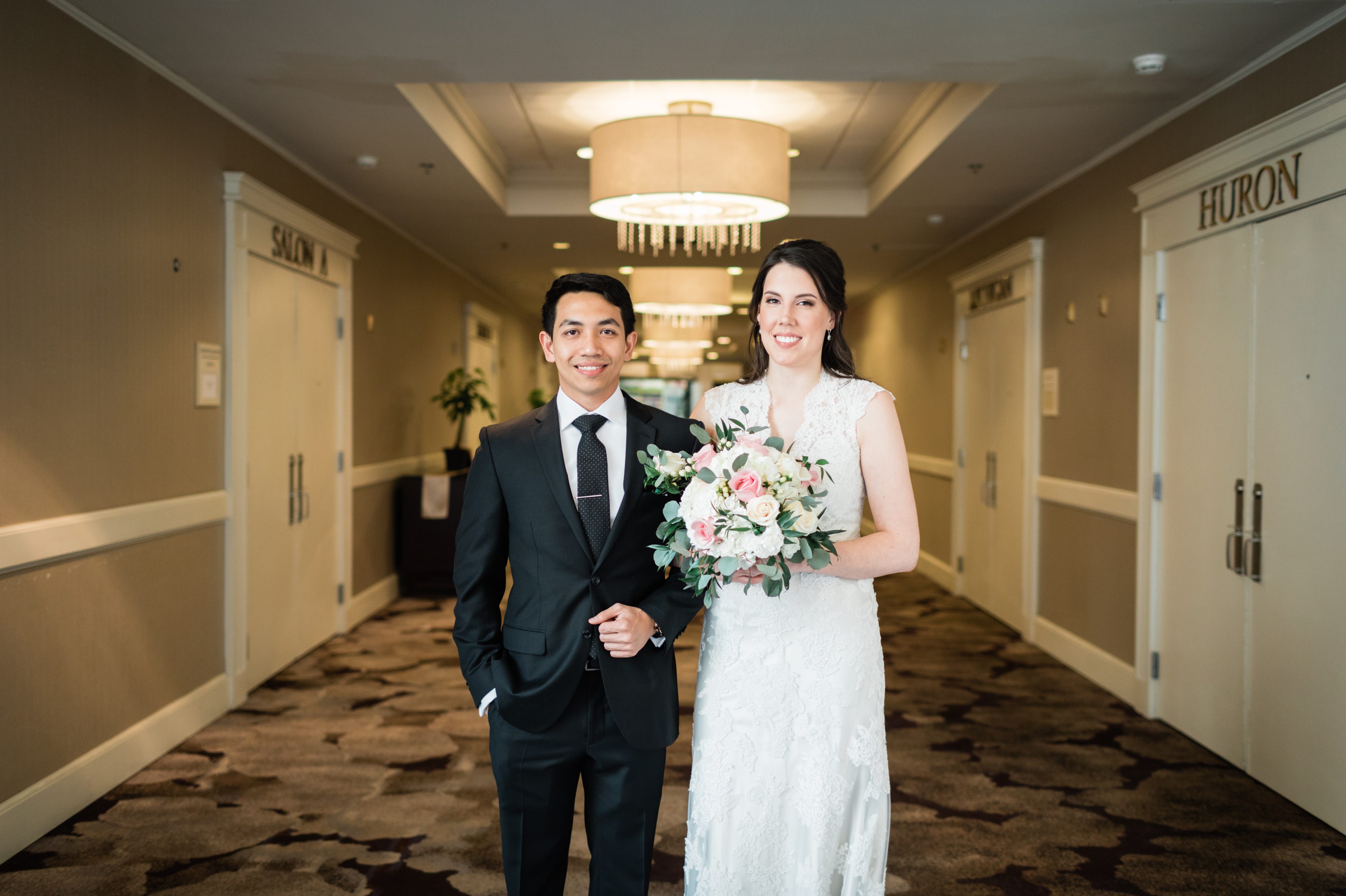 Bride and groom after their first look at an Intimate Wedding in Livonia