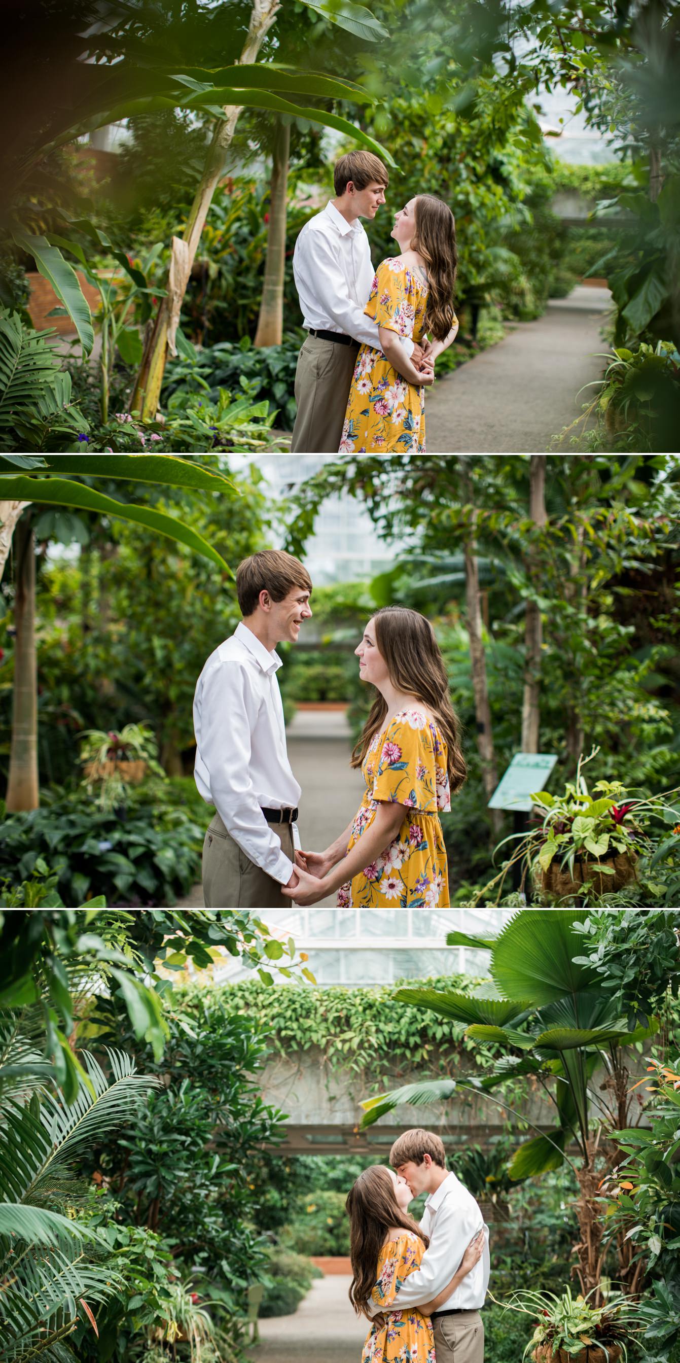 Guy and girl kissing inside the gardens at Matthaei Botanical Gardens in Ann Arbor, Michigan