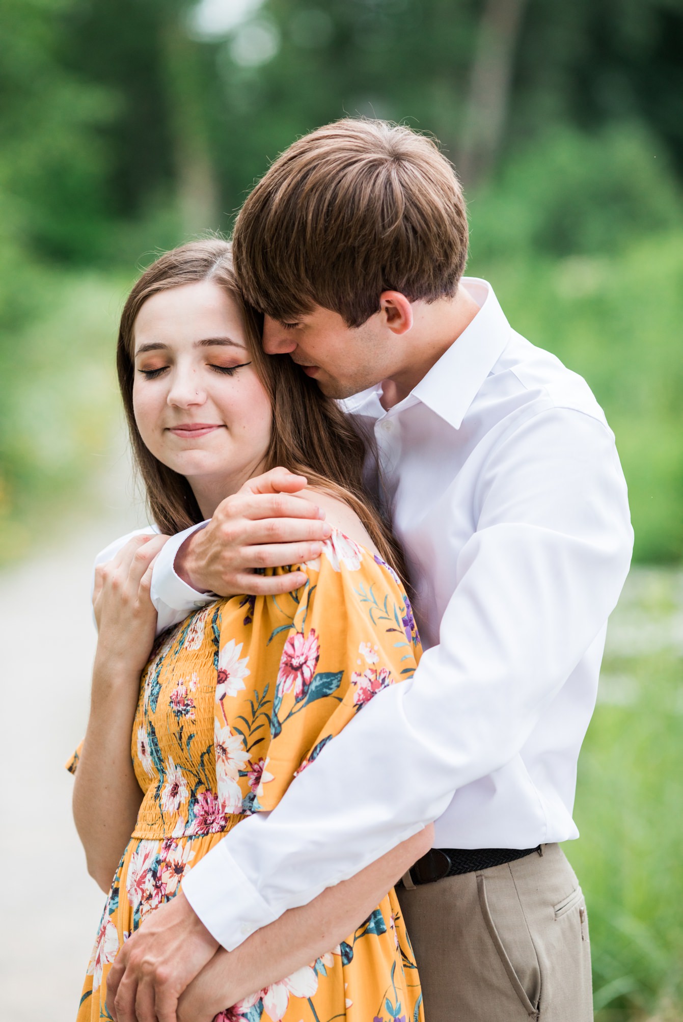 Guy holding his girl at the Matthaei Botanical Gardens in Ann Arbor, Michigan