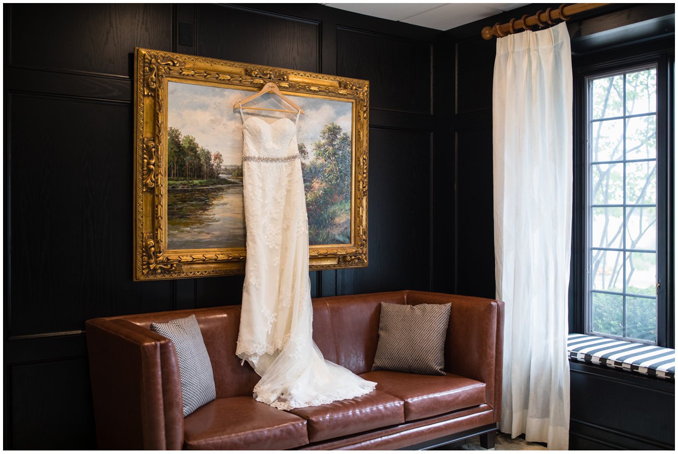 Wedding dress hanging on art at Fox Hills Country Club in Plymouth Michigan