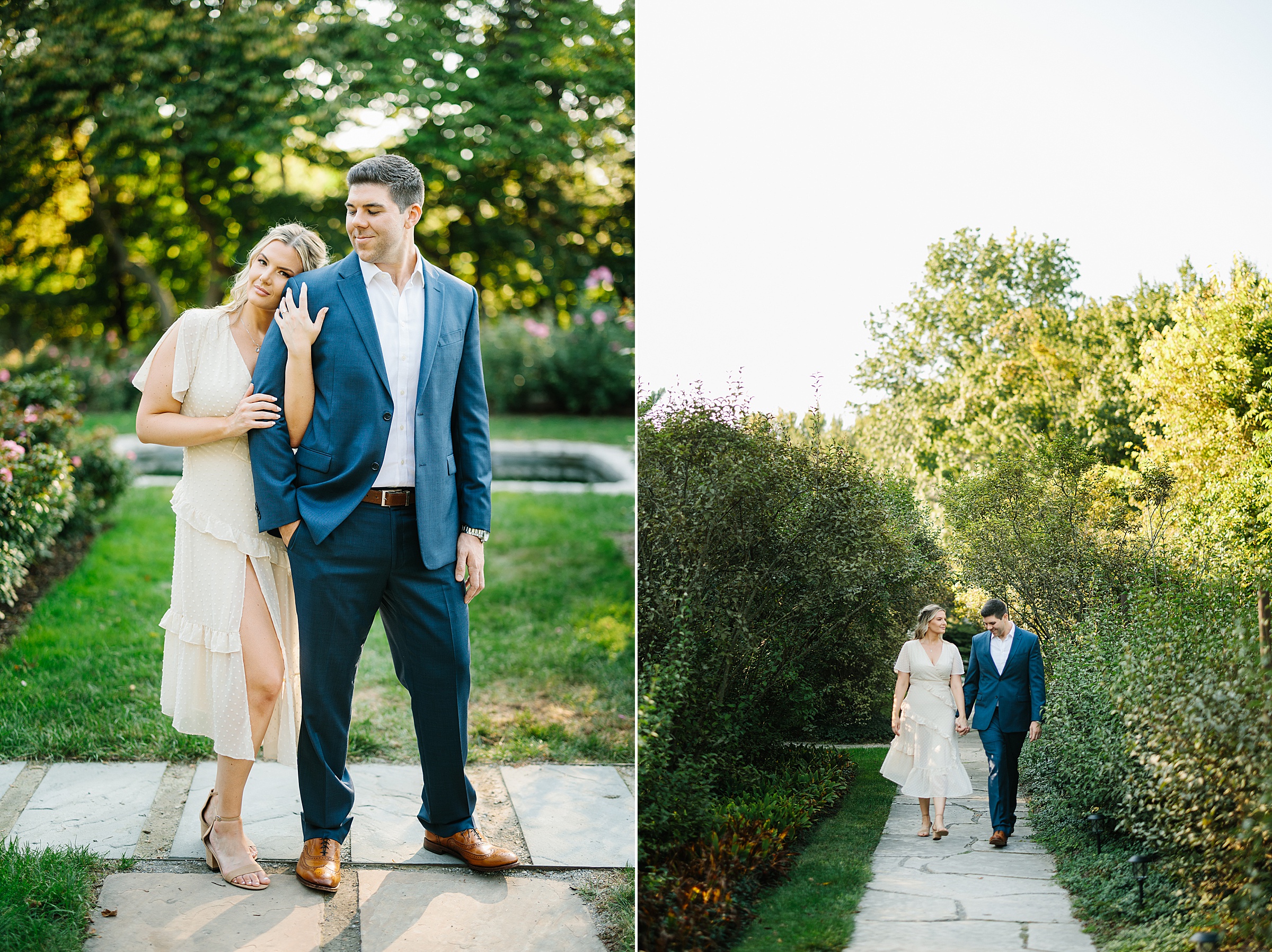 Future bride comes up from behind and holds her fiancé's arm; engaged couple takes a stroll while holding hands by Detroit Wedding Photographer Michele Maloney