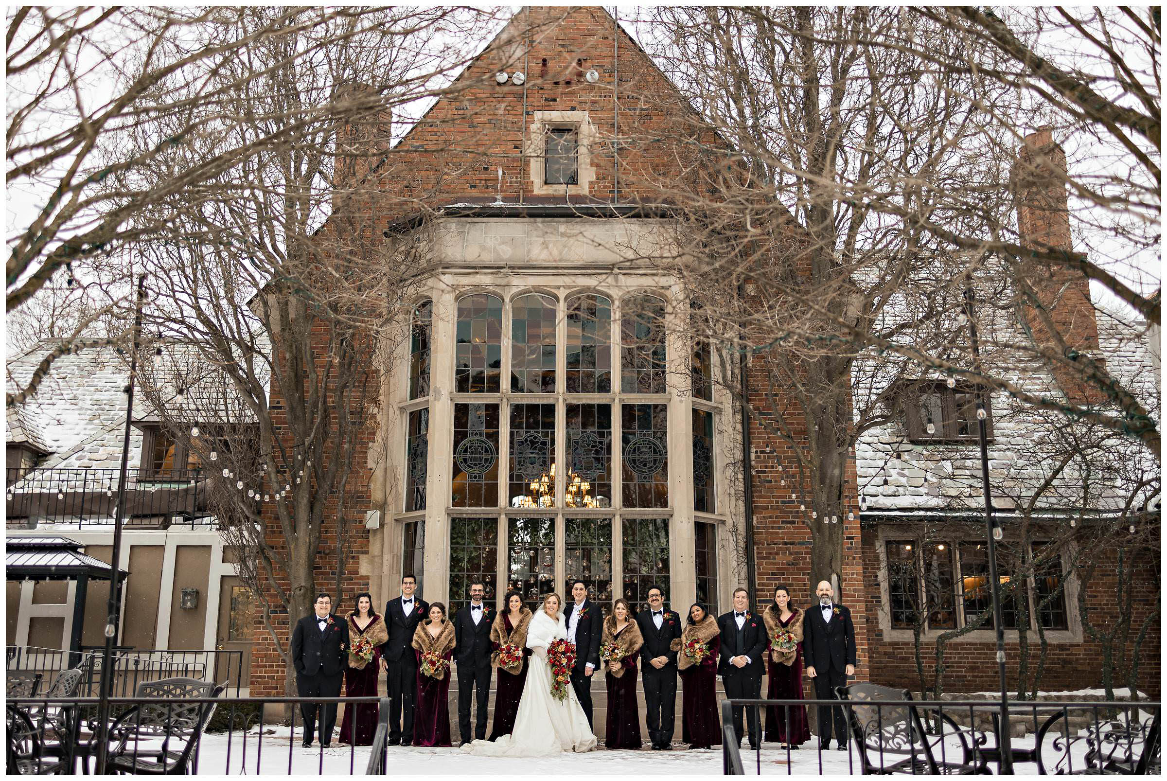 Bridal party formals outside in the snow by Detroit Wedding Photographer Michele Maloney