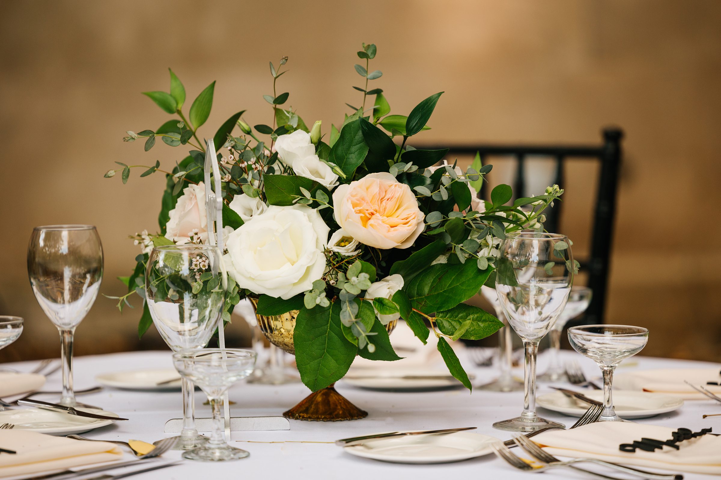 Detailed shot of the floral center pieces for The Inn at the Michigan League Wedding by Detroit Wedding Photographer Michele Maloney