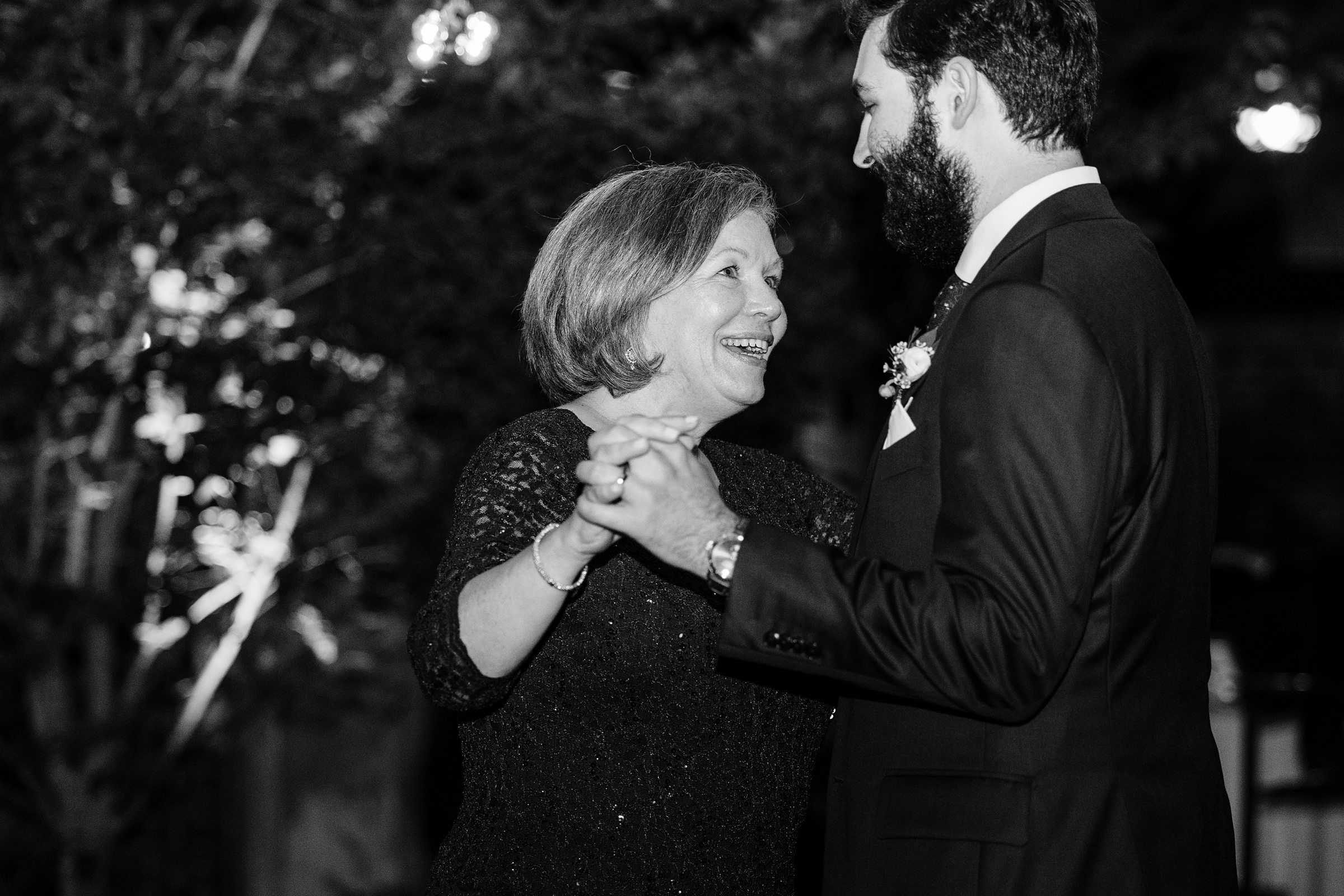 Black and white photo of the mother son wedding dance by Detroit Wedding Photographer Michele Maloney