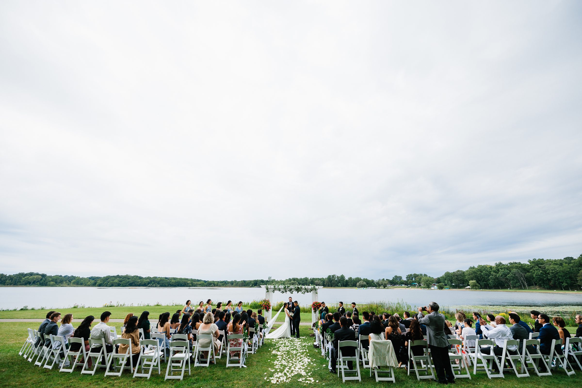 Faraway shot of outdoor ceremony for the Walenwoods Summer wedding by Detroit Wedding Photographer Michele Maloney 