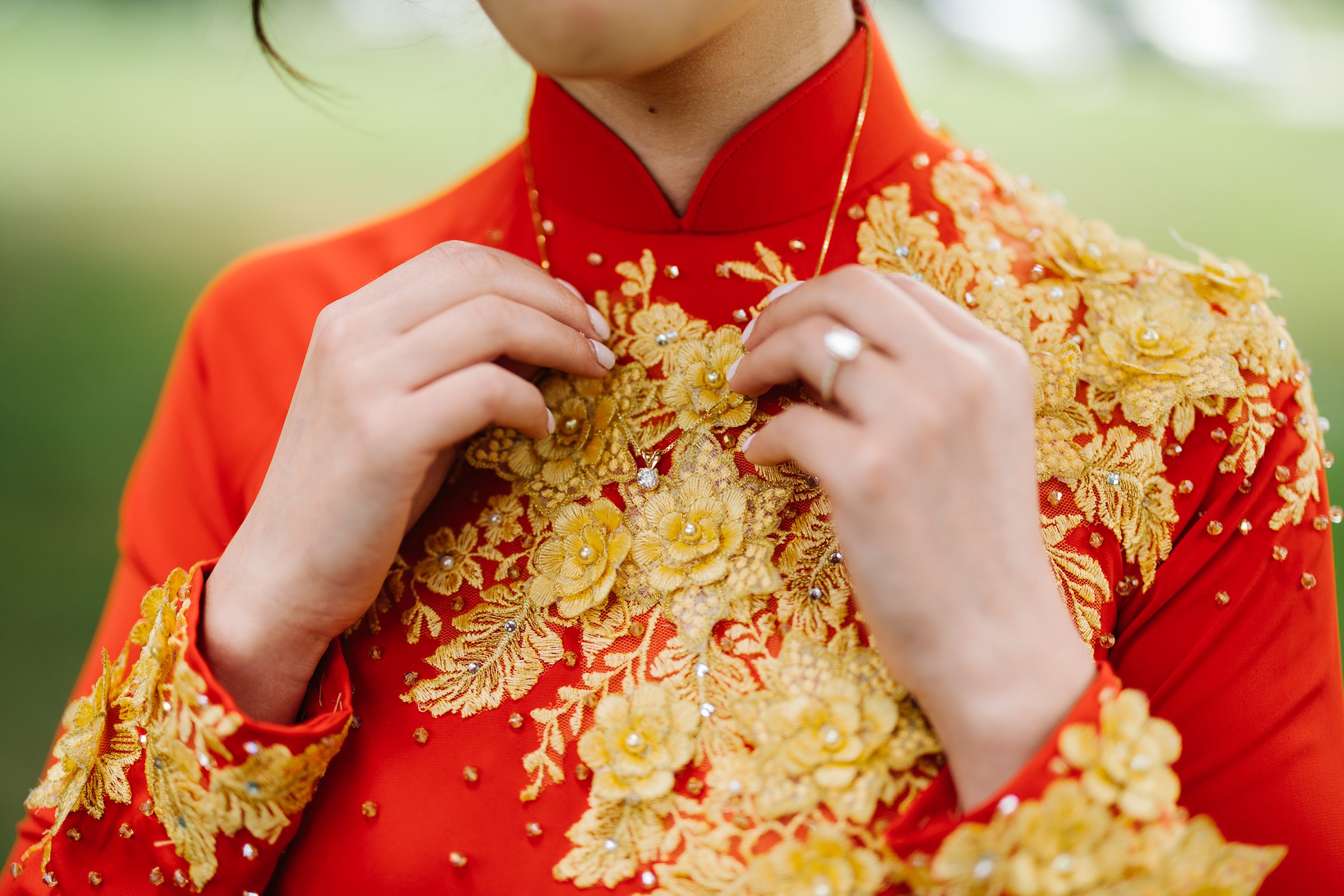 Close up portrait of part of the bride's traditional Korean dress by Detroit Wedding Photographer Michele Maloney
