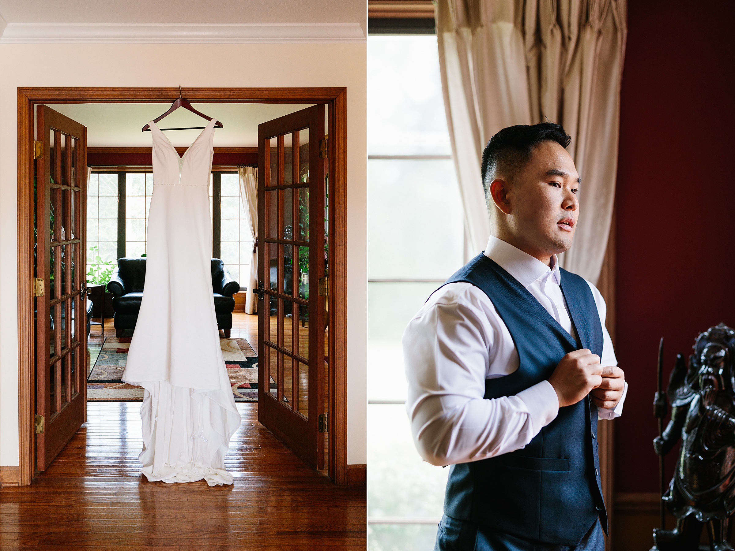 Wedding dress hangs from the doorway; groom is buttoning up his vest as he gets ready for the ceremony by Detroit Wedding Photographer Michele Maloney