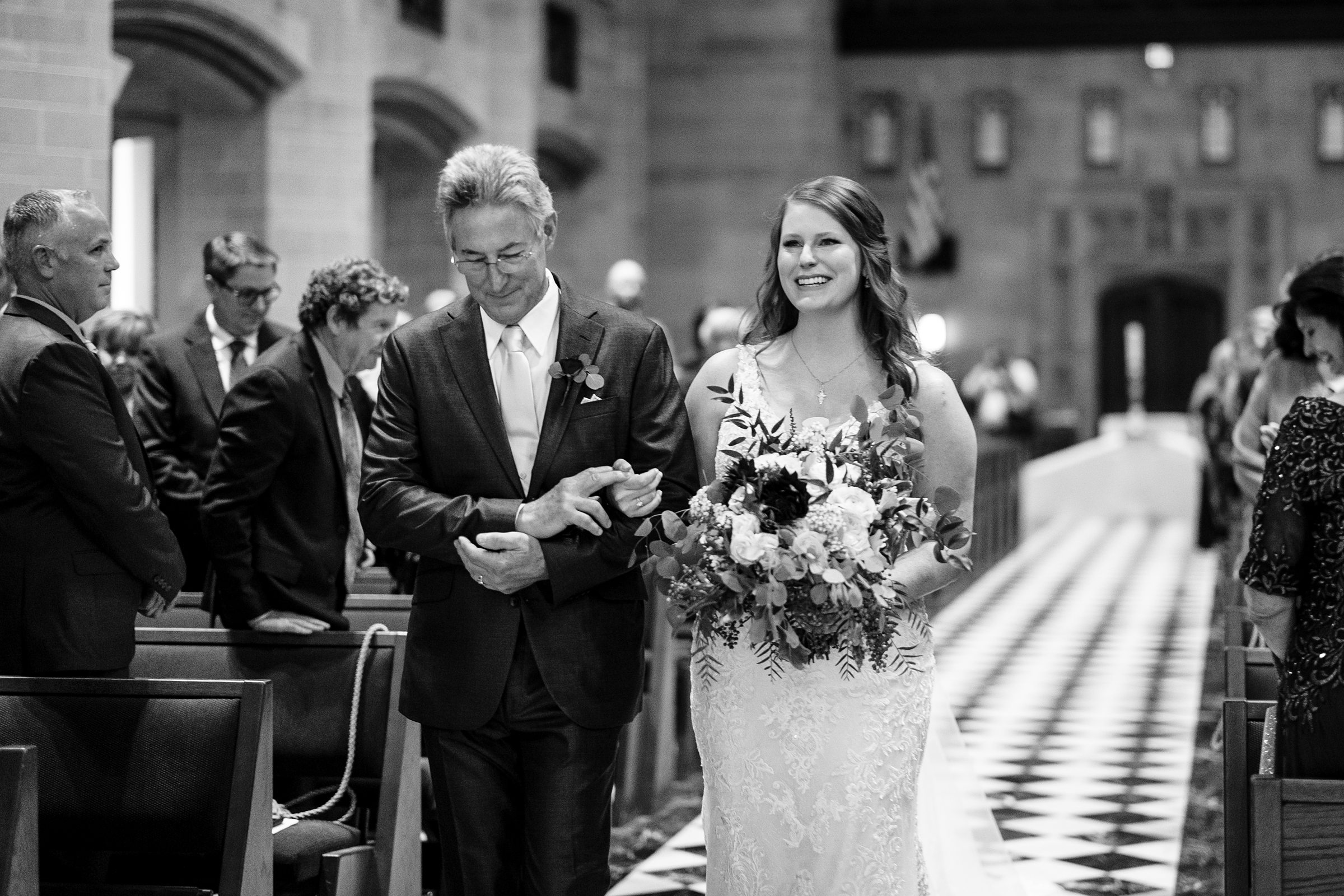 Father walking the bride down the aisle at the Cathedral of the Most Blessed Sacrament in Detroit Michigan by Michele Maloney Photography
