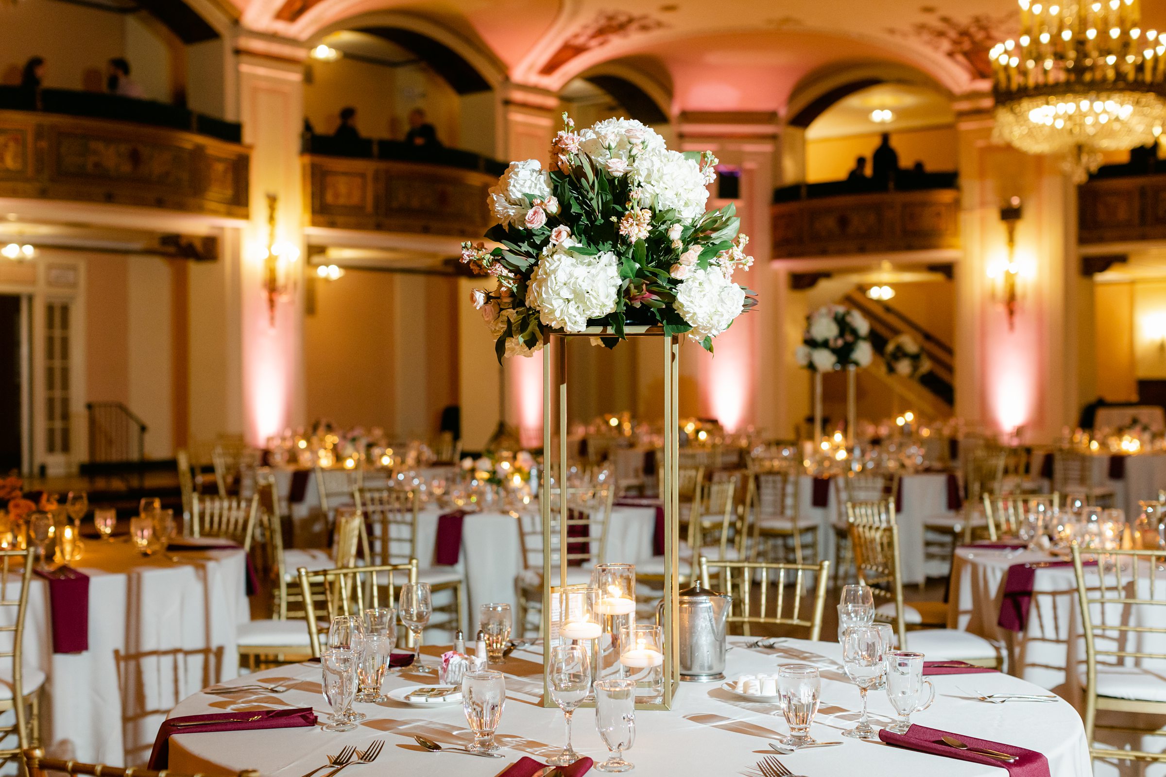 Beautiful decor and flower arrangement at the Masonic Temple ballroom in Detroit Michigan by Michele Maloney Photography