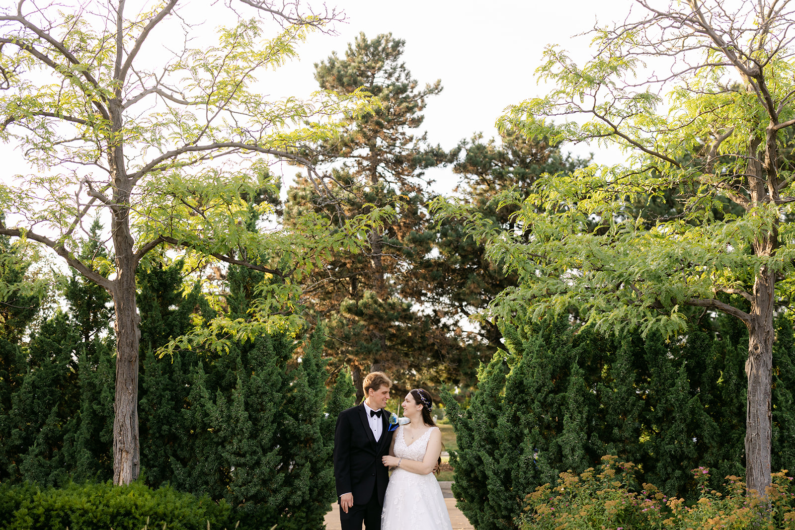 Rob and Kelly posing for portraits outside the Kensington Hotel.