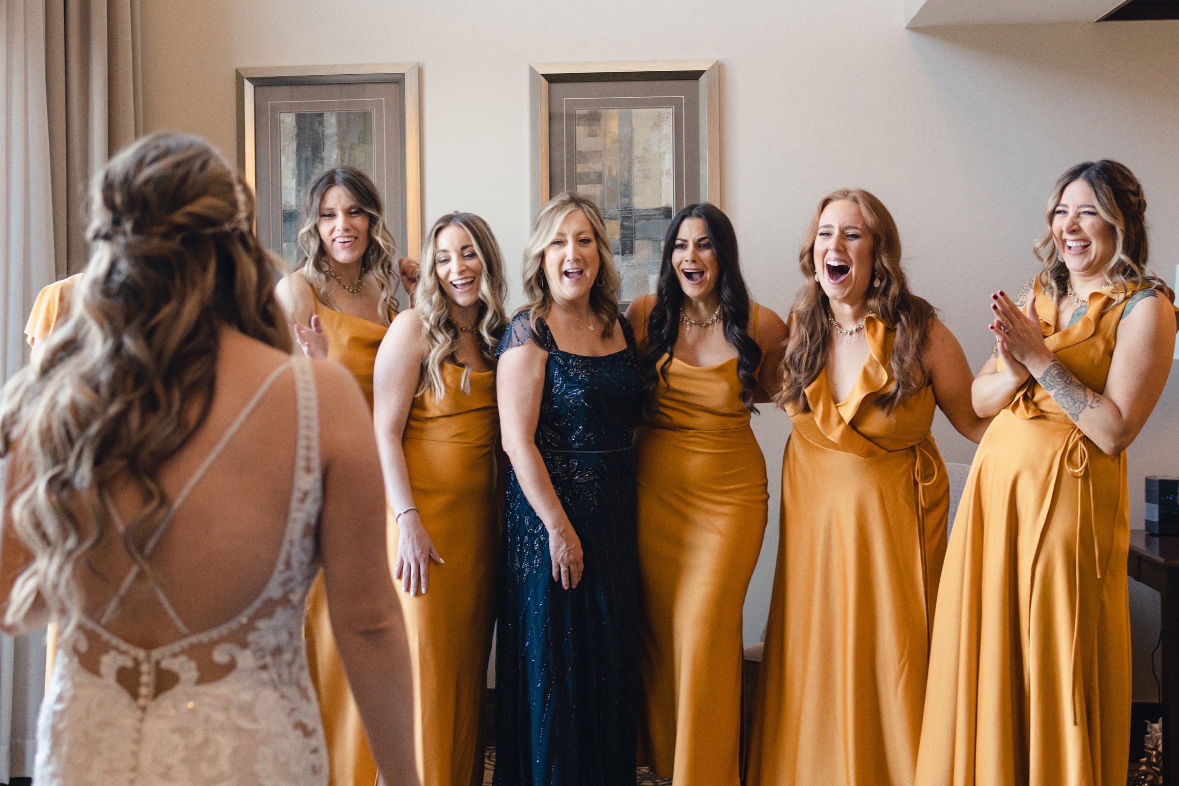First look with bridesmaids at the Saint John's Resort by Michele Maloney Photography