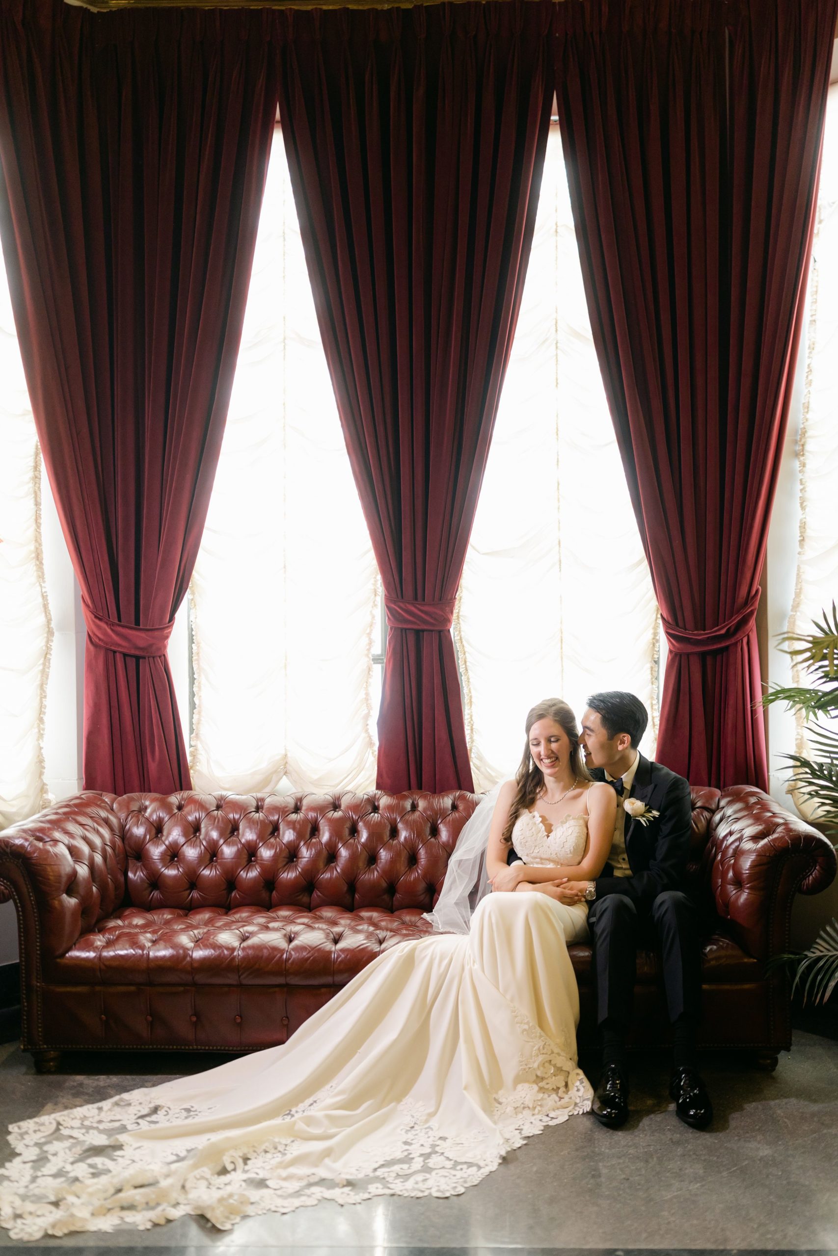 bride and groom at the guest entrance at the  Masonic Temple Wedding in Detroit by Michele Maloney Photography