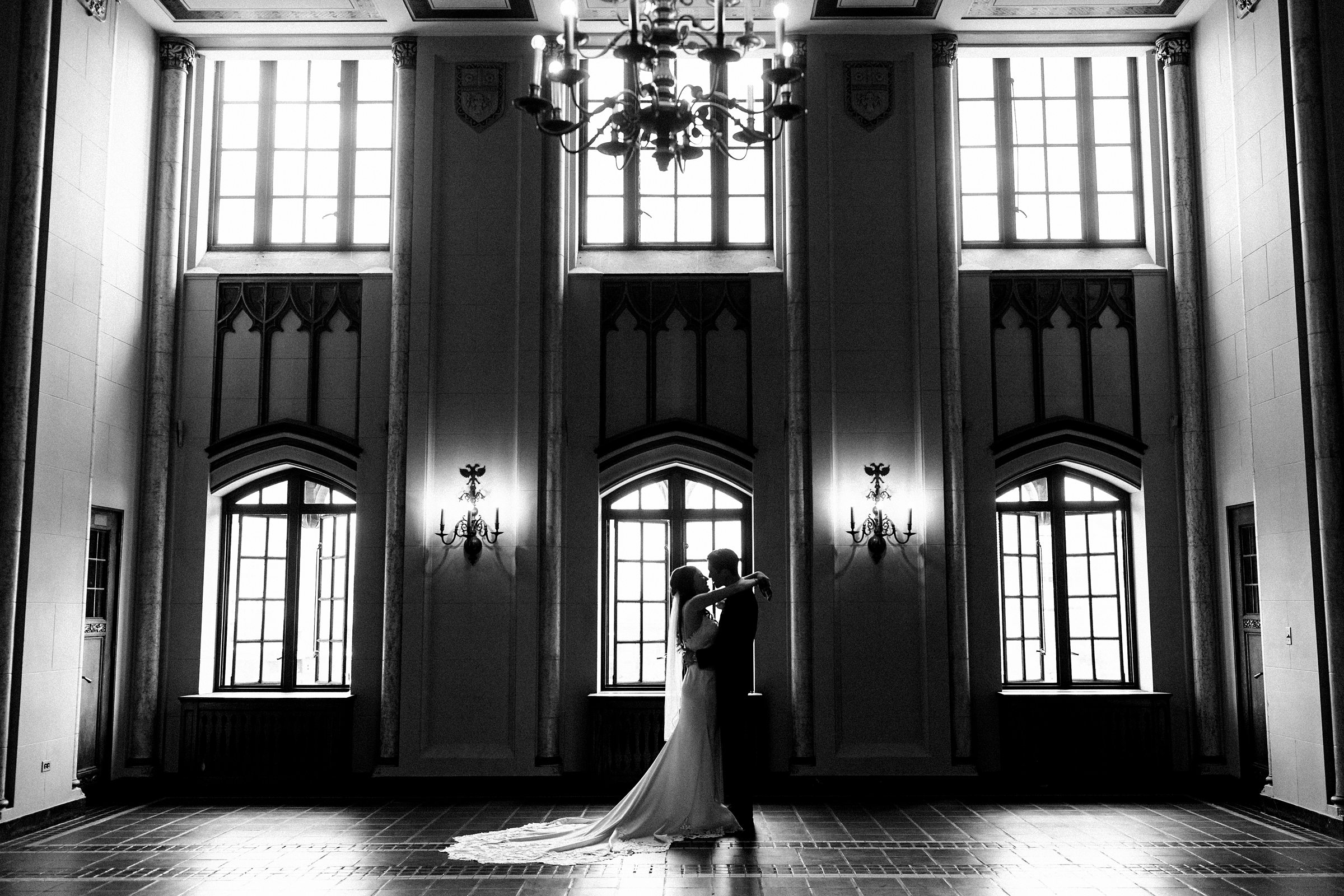 First look of bride and groom at the Masonic Temple in Detroit by Michele Maloney Photography