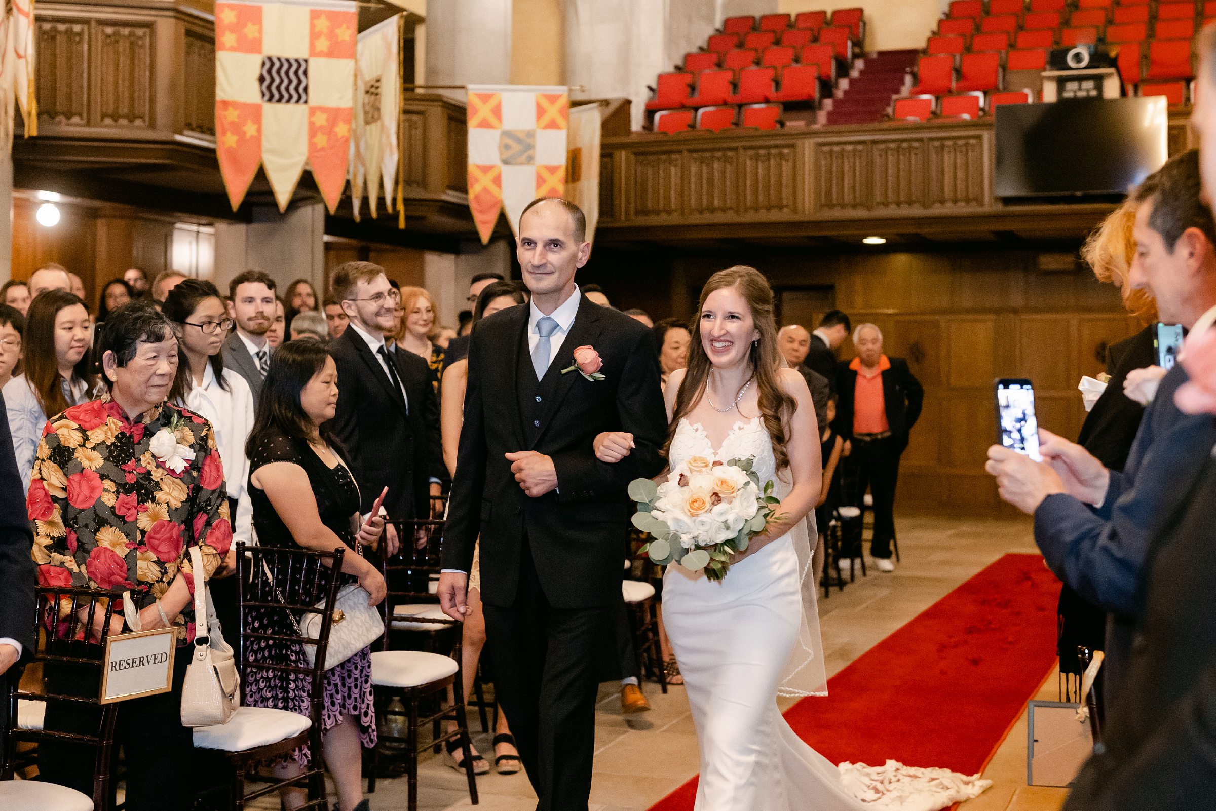 Father walking down the aisle with his daughter at the Masonic Temple in Detroit by Michele Maloney Photography
