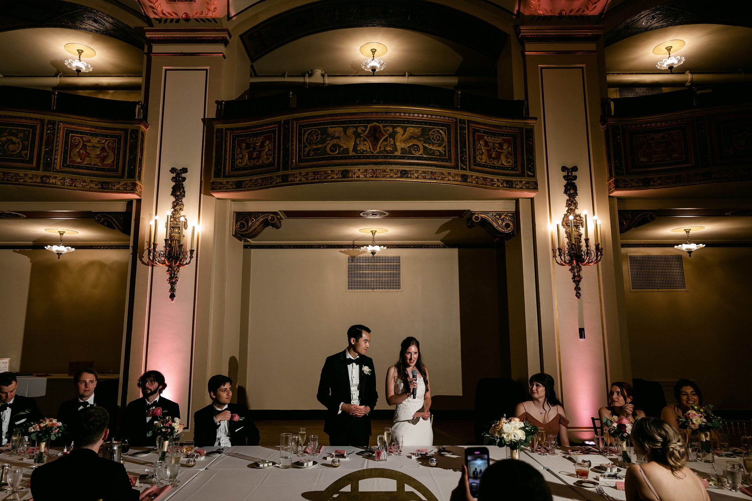 Wedding couple speaking at the Masonic Temple in Detroit by Michele Maloney Photography