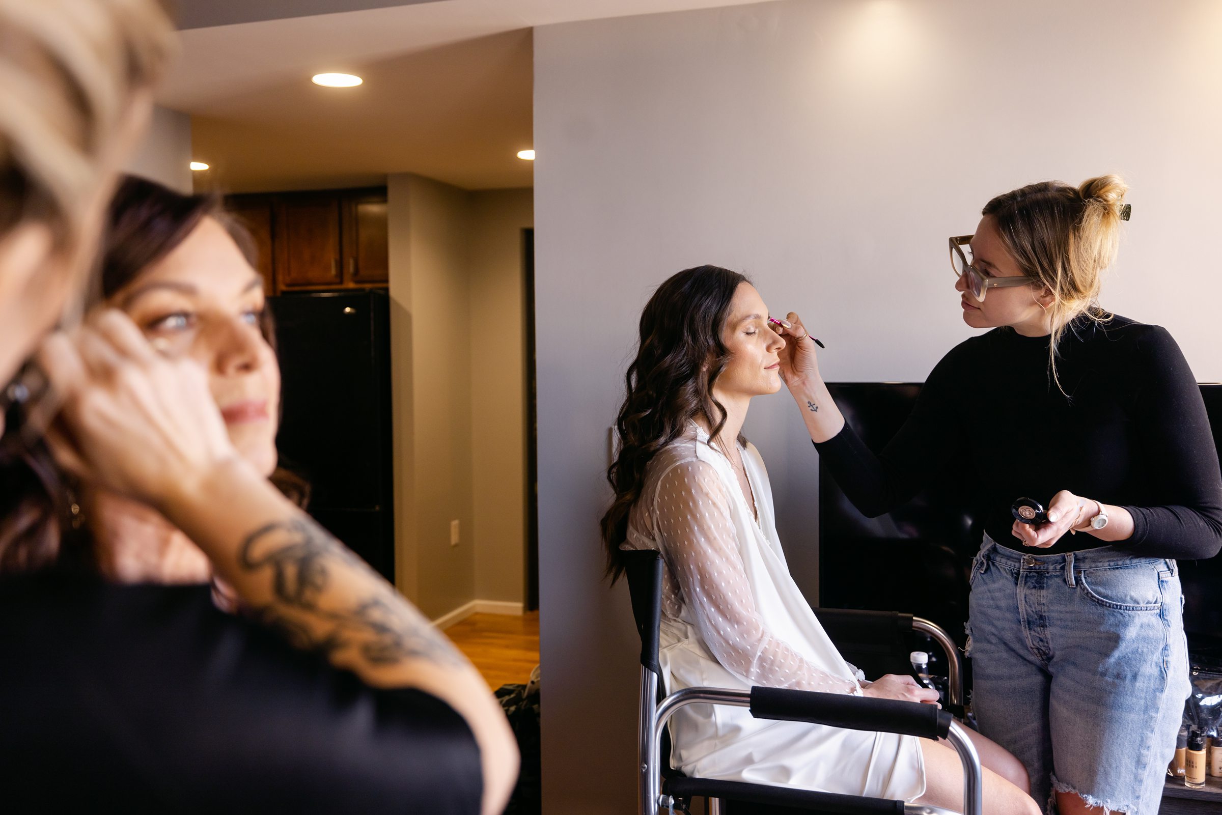 bride and her mom getting ready at the Treasury air BnB by Michele Maloney Photography