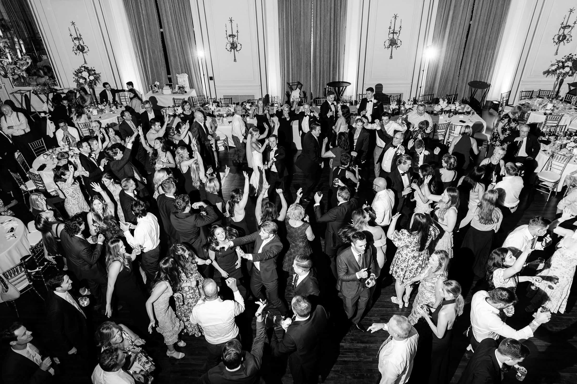 black and white photo of packed dance floor at Colony Club Detroit wedding