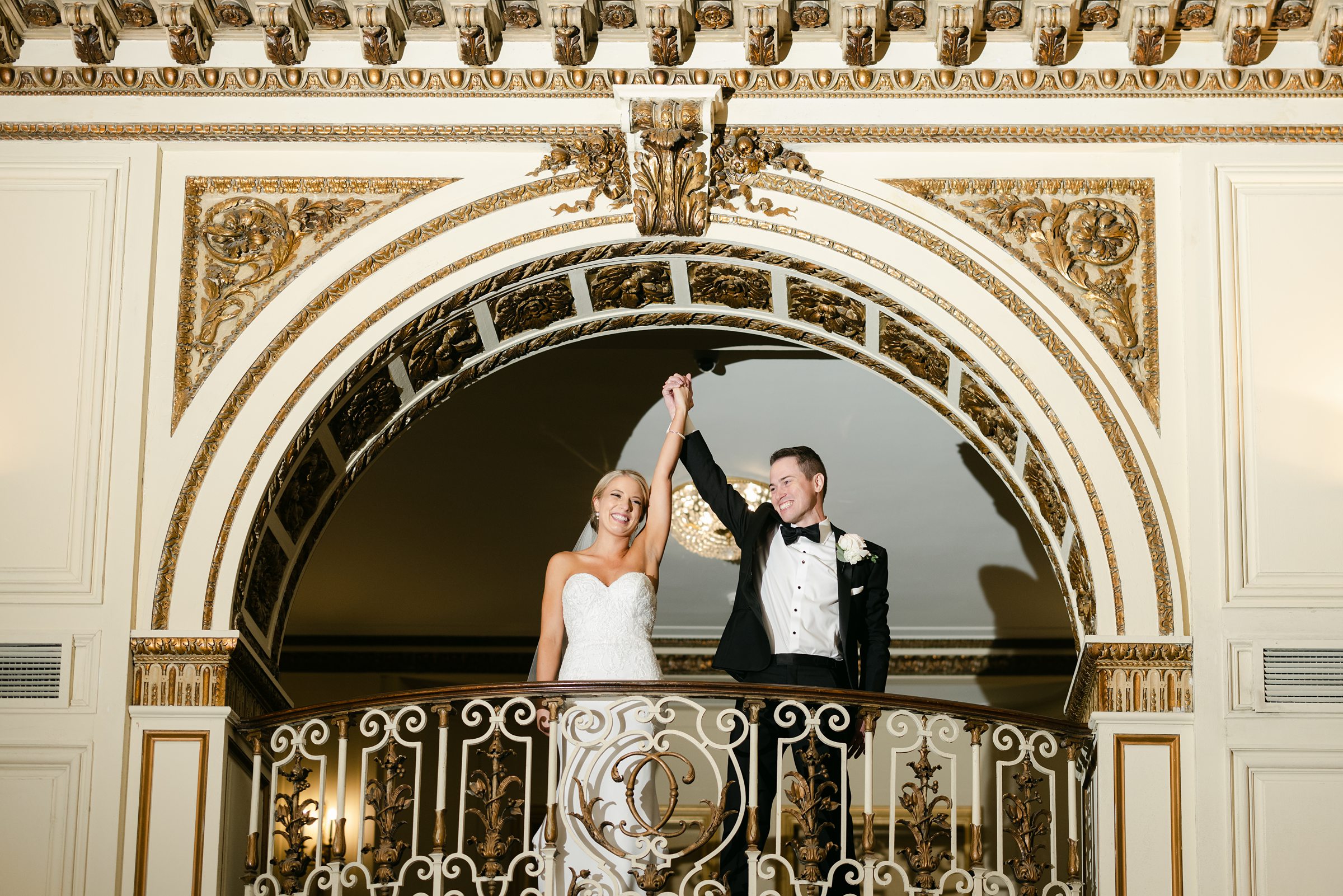 Bride and Groom's grand entrance at the balcony at the Colony Club by Michele Maloney Photography