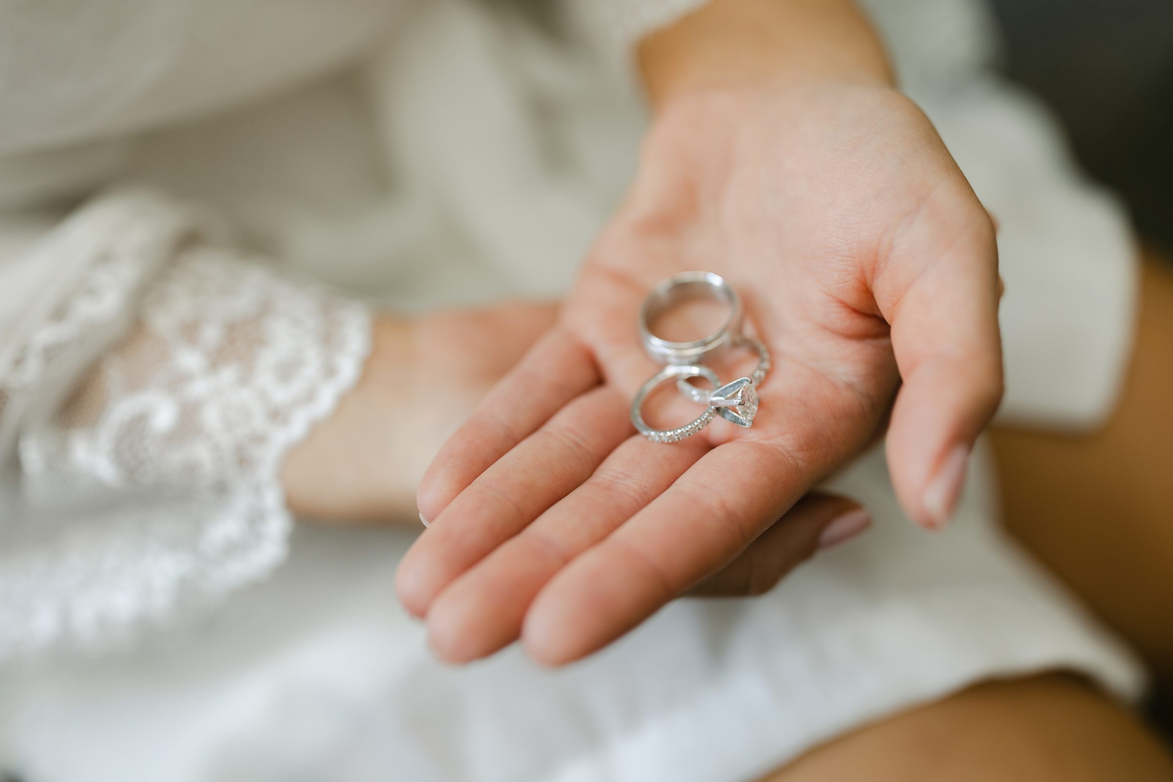 close up of wedding rings at for wedding at Colony Club by Michele Maloney Photography