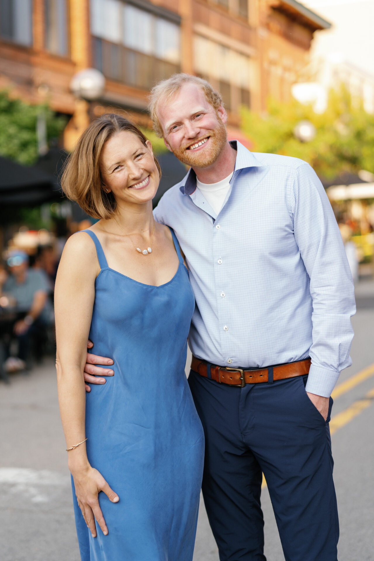 portrait of couple in the city during their whimsical ann arbor engagement session