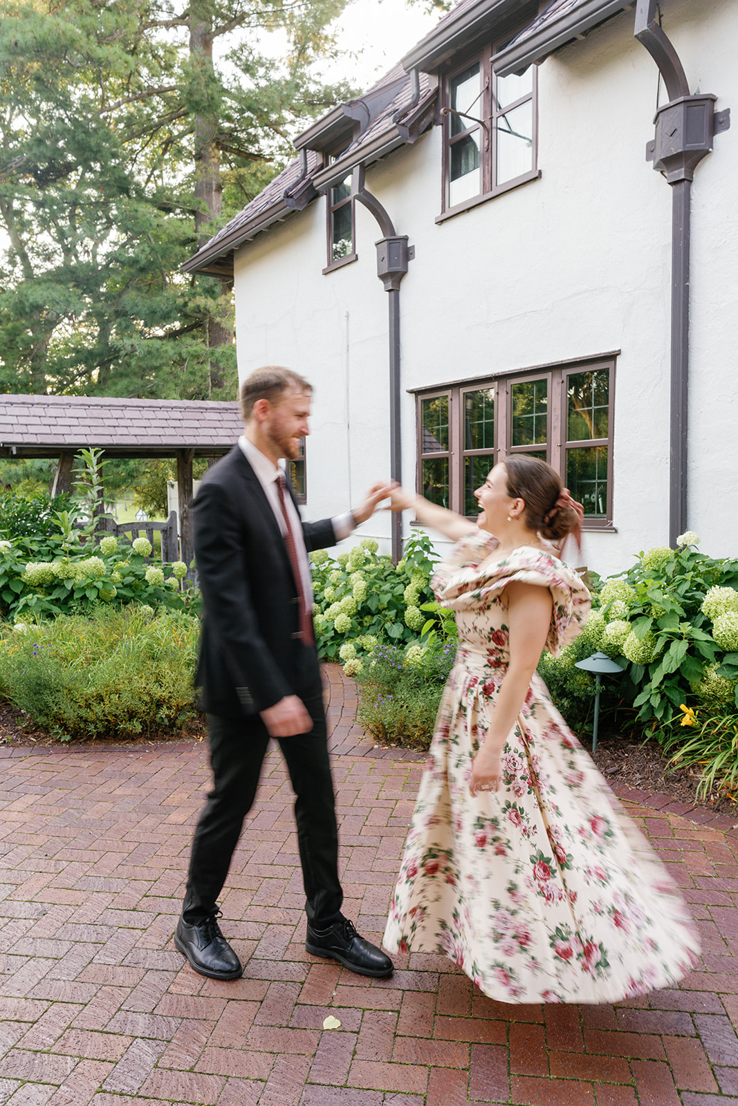Peter & Cecilia dancing around at Addison Oaks during their summer engagement shoot.