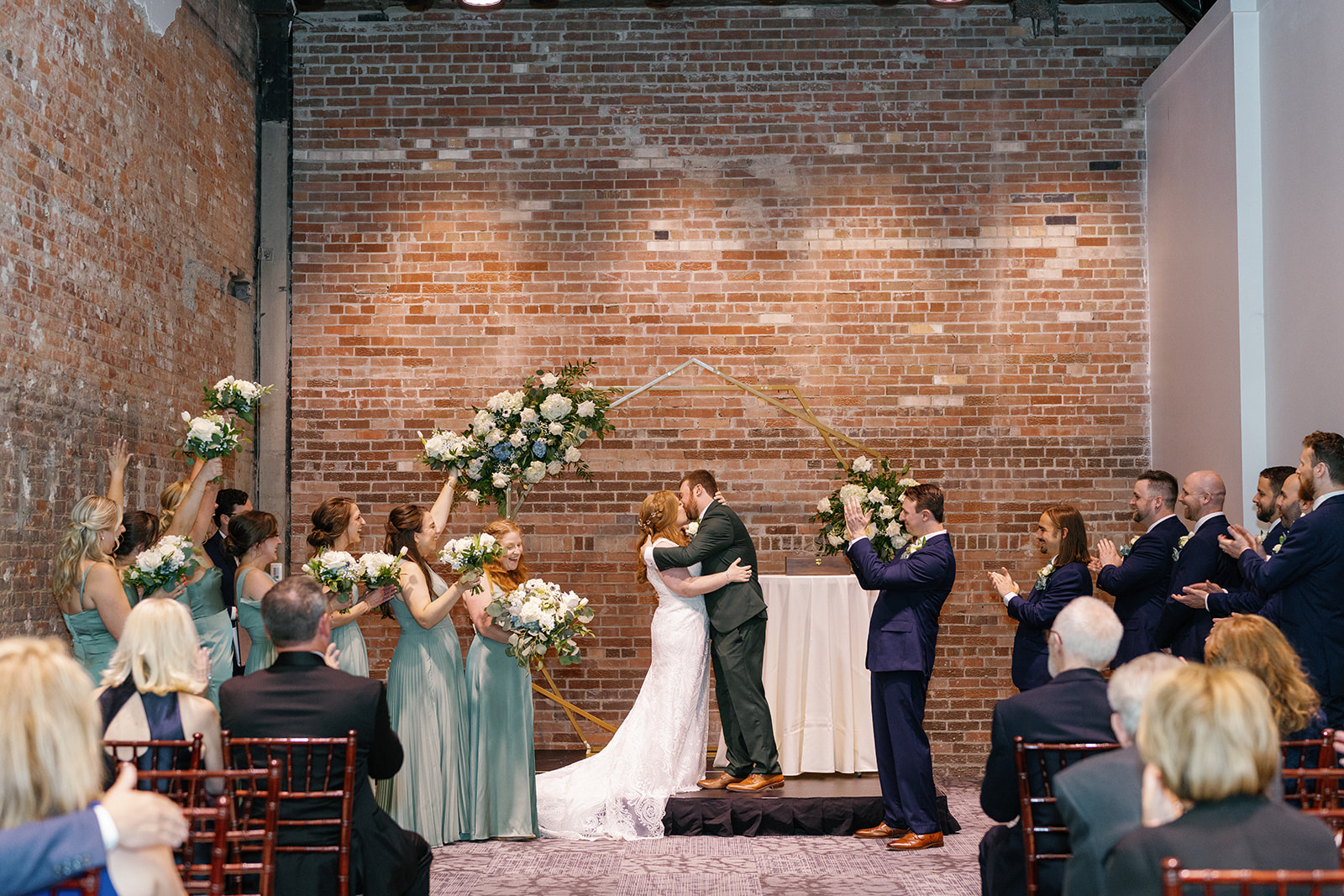 Guests celebrating with Paul and Elyse after their June Wedding at the Treasury.