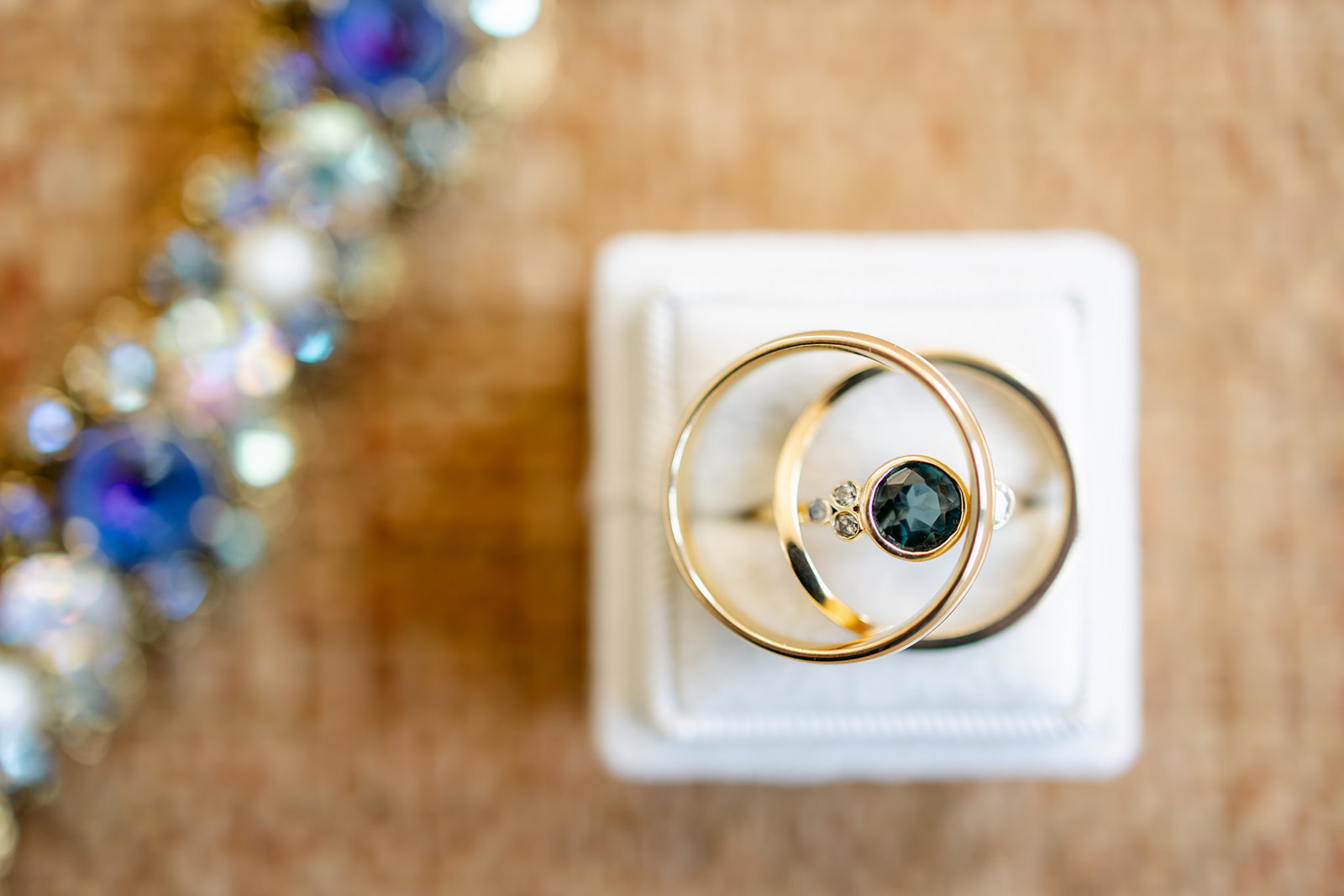 Detail shot of rings and invitations at the Shinola Hotel.