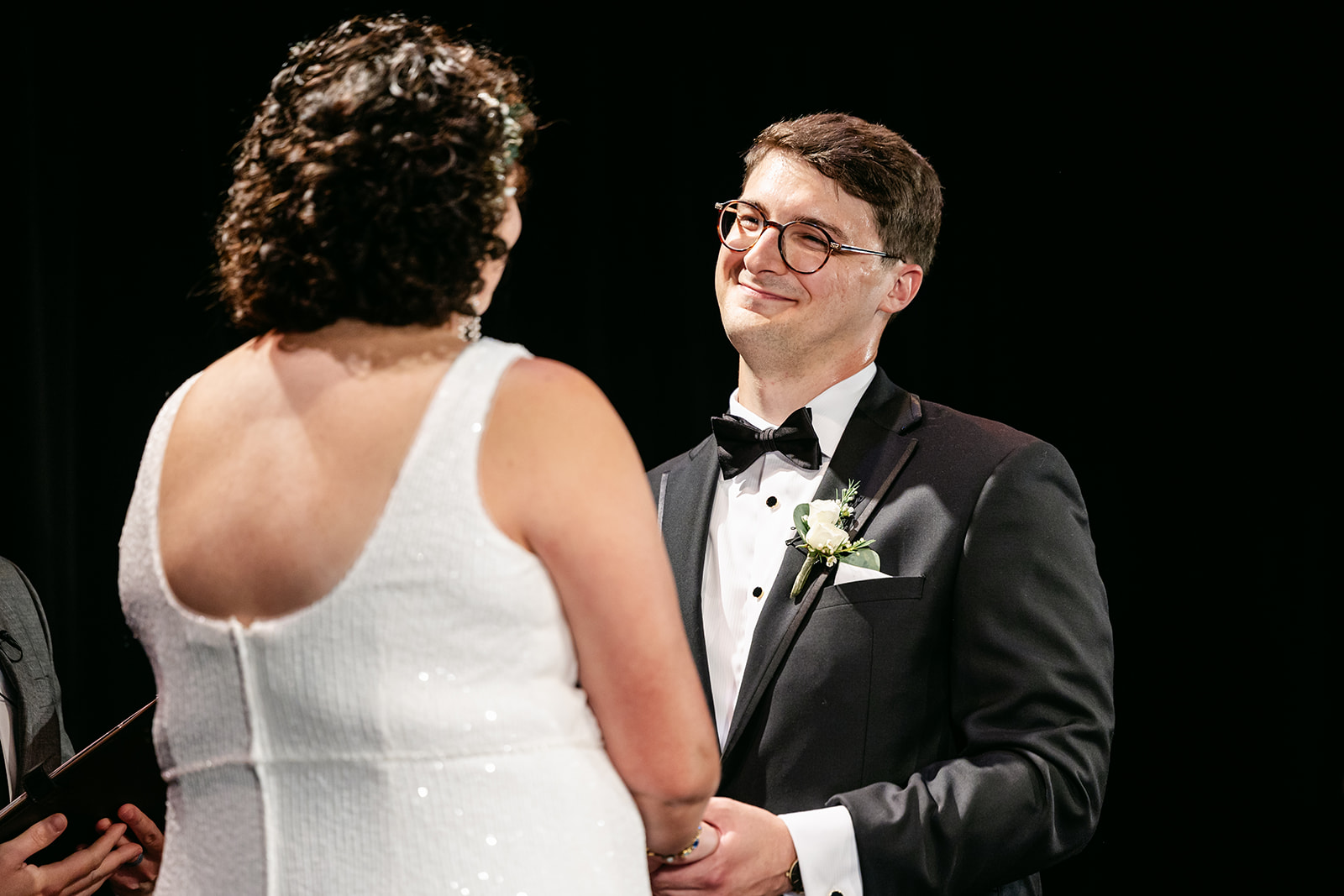 Tom and Sarah exchanging vows at the Detroit Gem Theatre.