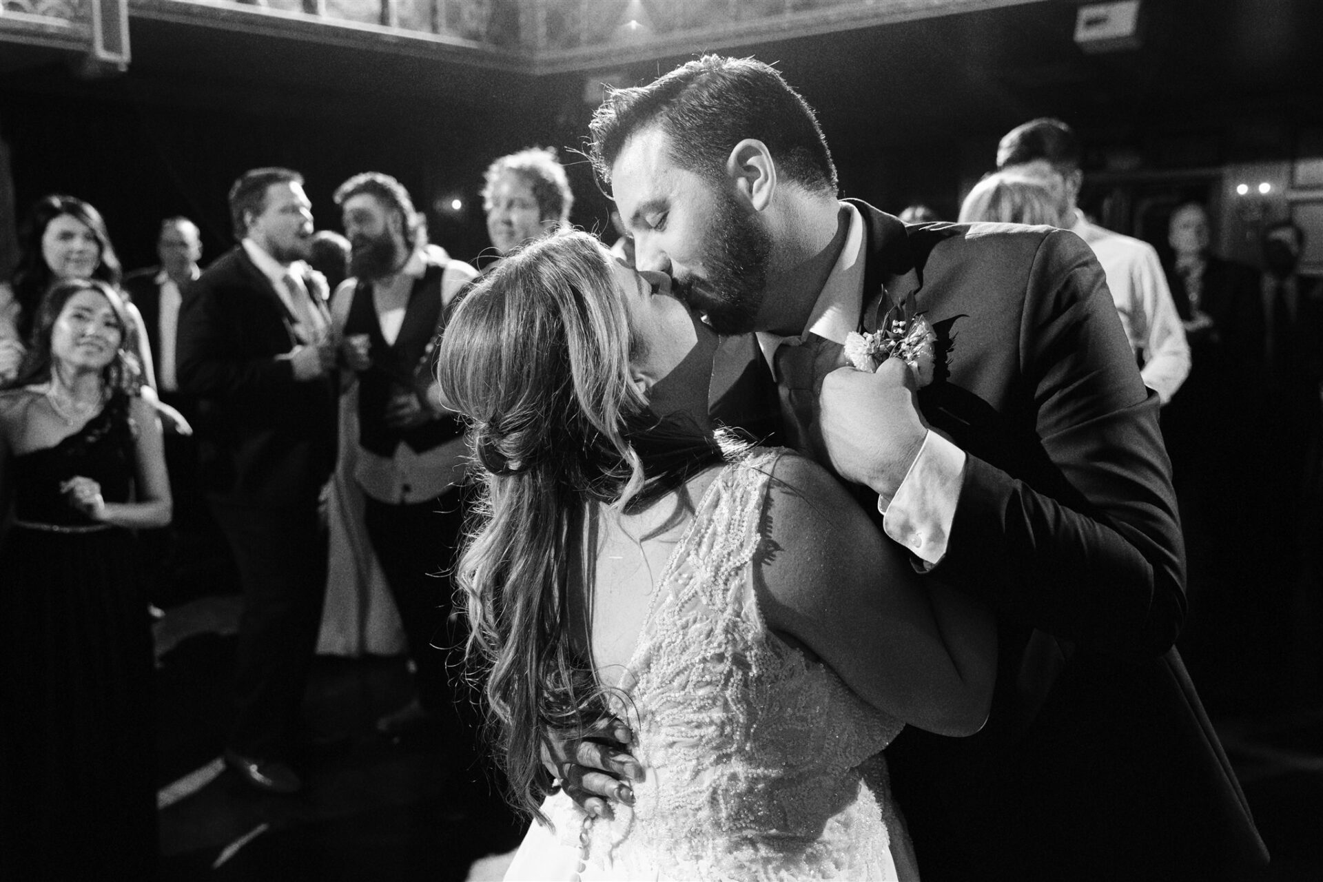 Romantic portrait of David and Christine inside the historic Gem Theatre.