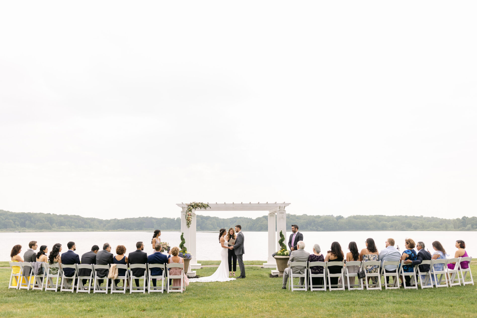 Intimate outdoor ceremony setup for Moss + Alice’s Micro Wedding at Waldenwoods.