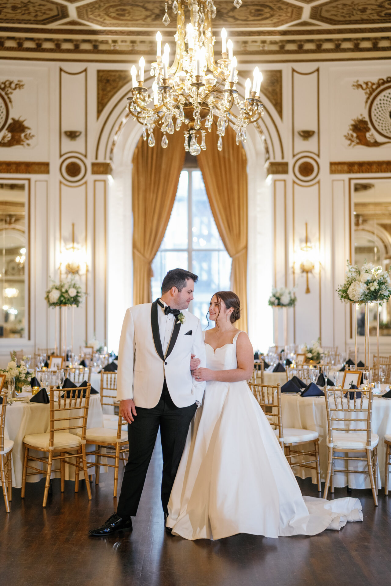 Classic portrait of the couple inside the Colony Club ballroom during their March Colony Club Wedding