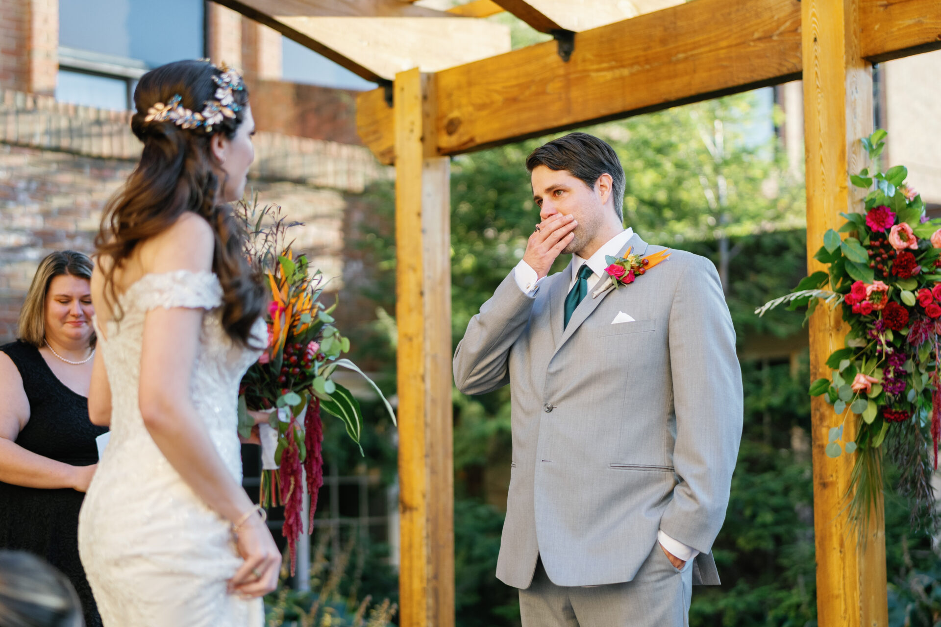 Couple exchanging vows during their Fall Wedding at the Kensington Hotel