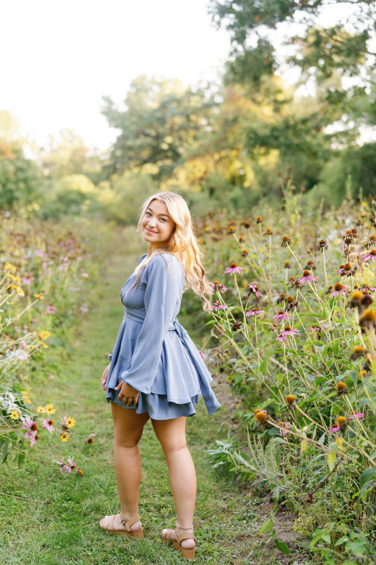 St. Catherine of Siena Academy senior enjoying her portrait session at Kensington Metropark.
