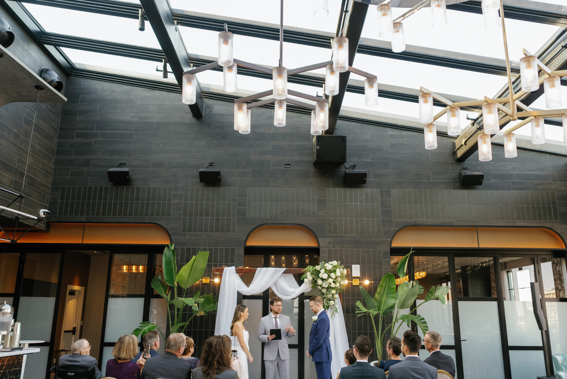 Wedding ceremony moment from Katie and Scott’s Godfrey Hotel Detroit Wedding.