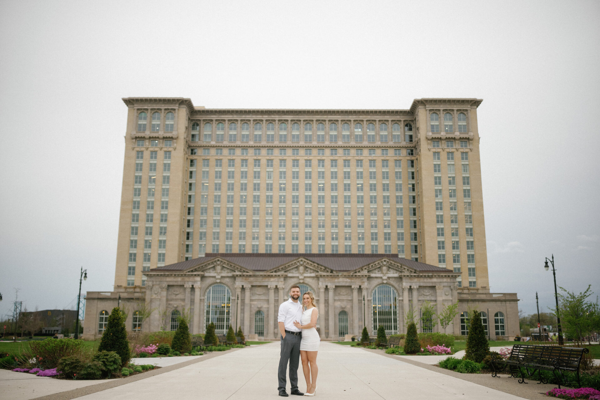 Jessica and Jordan in front of Michigan Central during their engagement session